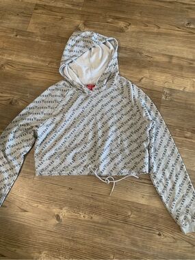 GUESS cropped all-over print logo hoodie